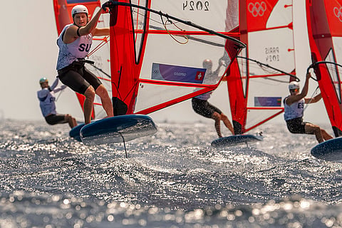 Switzerland's Elia Colombo breaks free from the pack